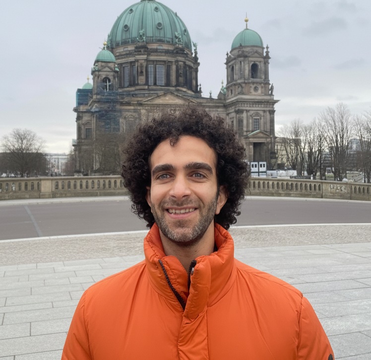 Mustafa, smiling